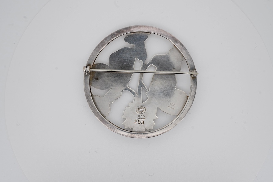 A Georg Jensen sterling moth and leaf circular brooch, design no. 283, 55mm, with Georg Jensen box. Condition - fair to good